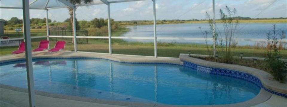 Slide of Pool Area with Lake Side View